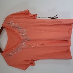 Women's  Orange top.